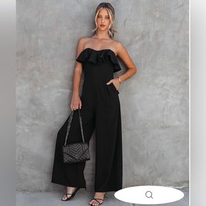 LEGEND HAS IT STRAPLESS RUFFLE JUMPSUIT - BLACK